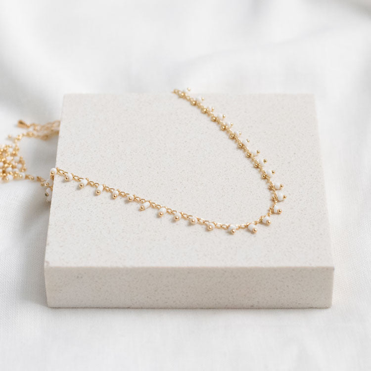 WHITE BEAD NECKLACE